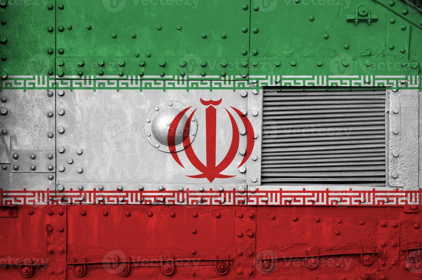 Iran flag depicted on side part of military armored tank closeup. Army forces conceptual background photo