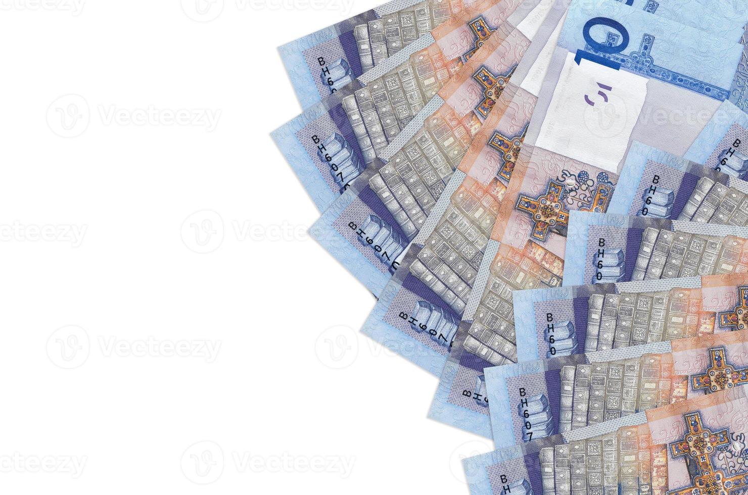 10 Belorussian rubles bills lies isolated on white background with copy space. Rich life conceptual background photo