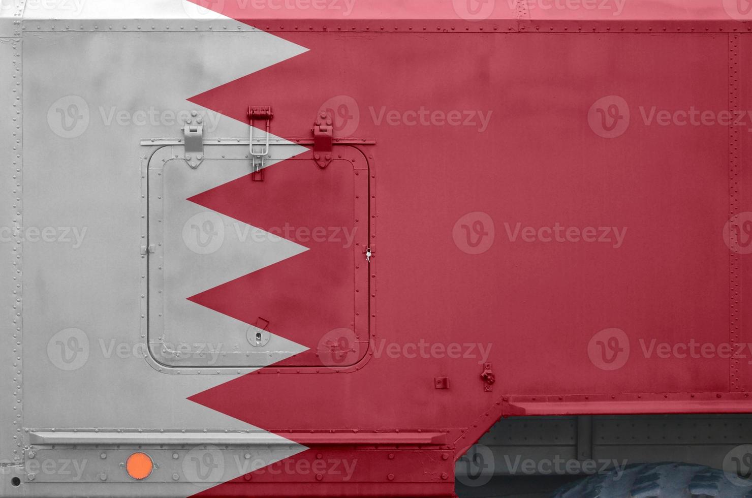 Bahrain flag depicted on side part of military armored truck closeup. Army forces conceptual background photo