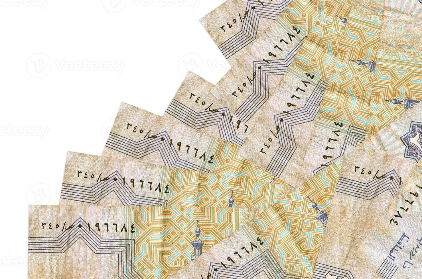 25 Egyptian piastres bills lies in different order isolated on white. Local banking or money making concept photo