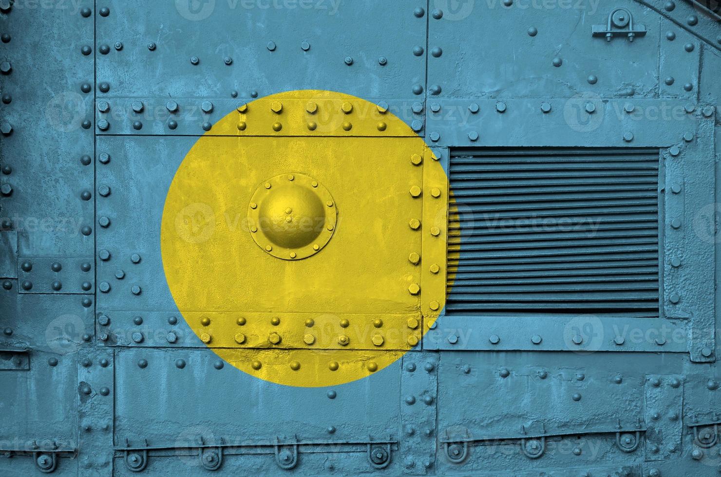 Palau flag depicted on side part of military armored tank closeup. Army forces conceptual background photo