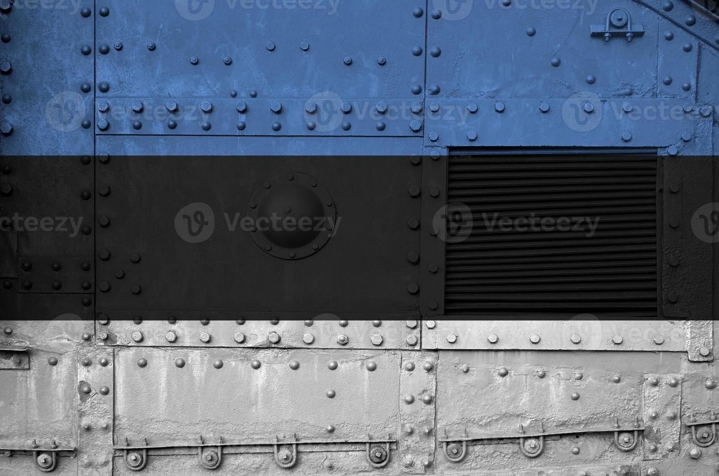 Estonia flag depicted on side part of military armored tank closeup. Army forces conceptual background photo