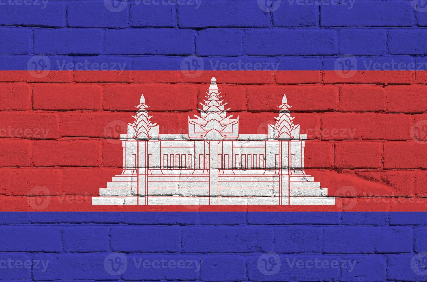 Cambodia flag depicted in paint colors on old brick wall. Textured banner on big brick wall masonry background photo