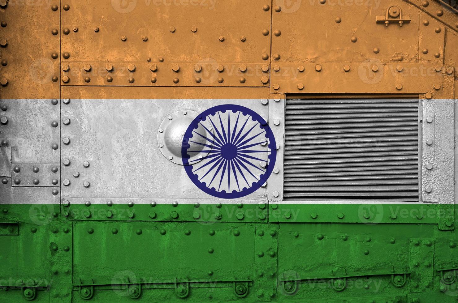 India flag depicted on side part of military armored tank closeup. Army forces conceptual background photo