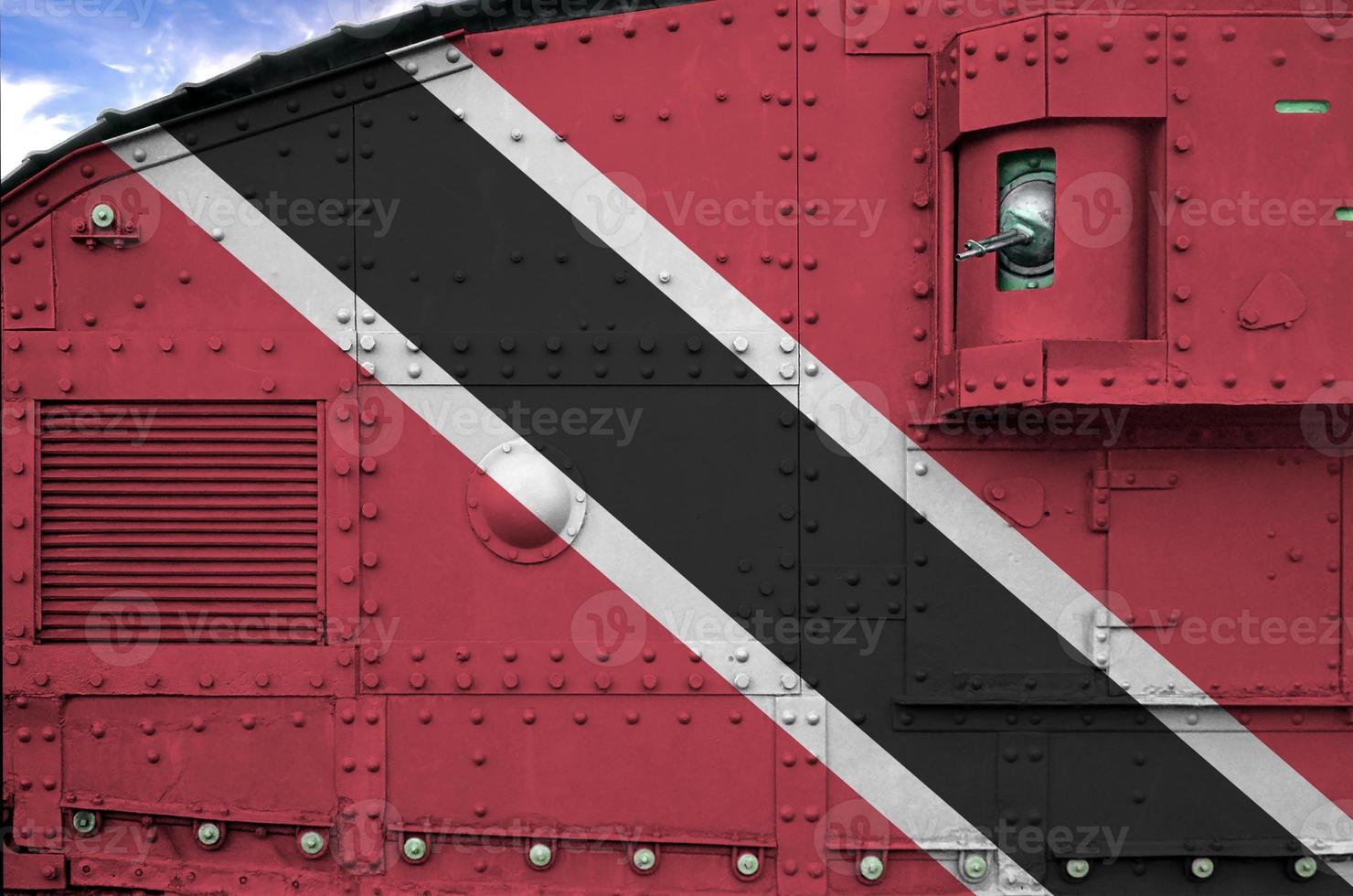 Trinidad and Tobago flag depicted on side part of military armored tank closeup. Army forces conceptual background photo