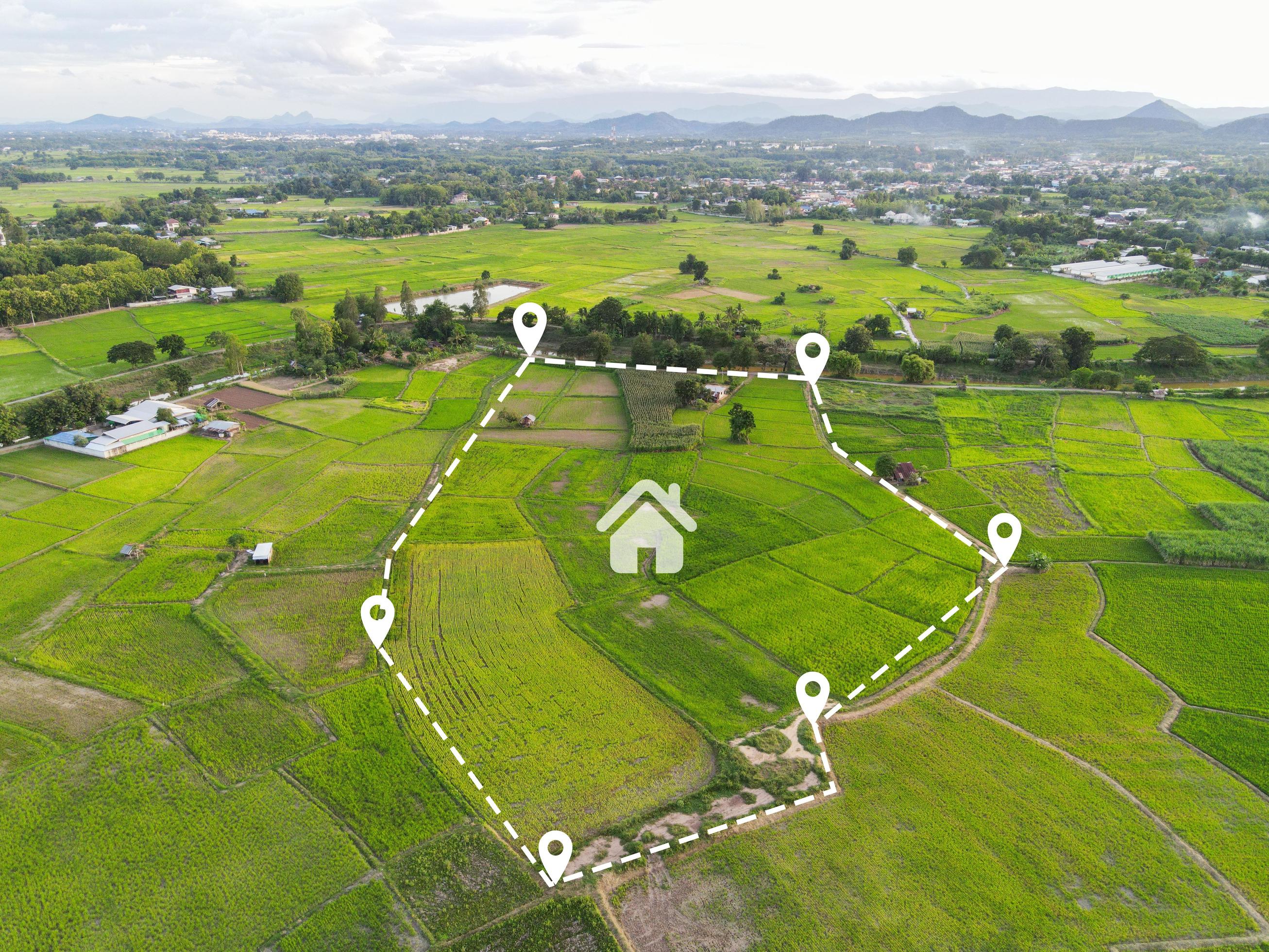 https://static.vecteezy.com/system/resources/previews/014/943/901/large_2x/land-plot-for-building-house-aerial-view-land-field-with-pins-pin-location-for-housing-subdivision-residential-development-owned-sale-rent-buy-or-investment-home-or-house-expand-the-city-suburb-free-photo.JPG