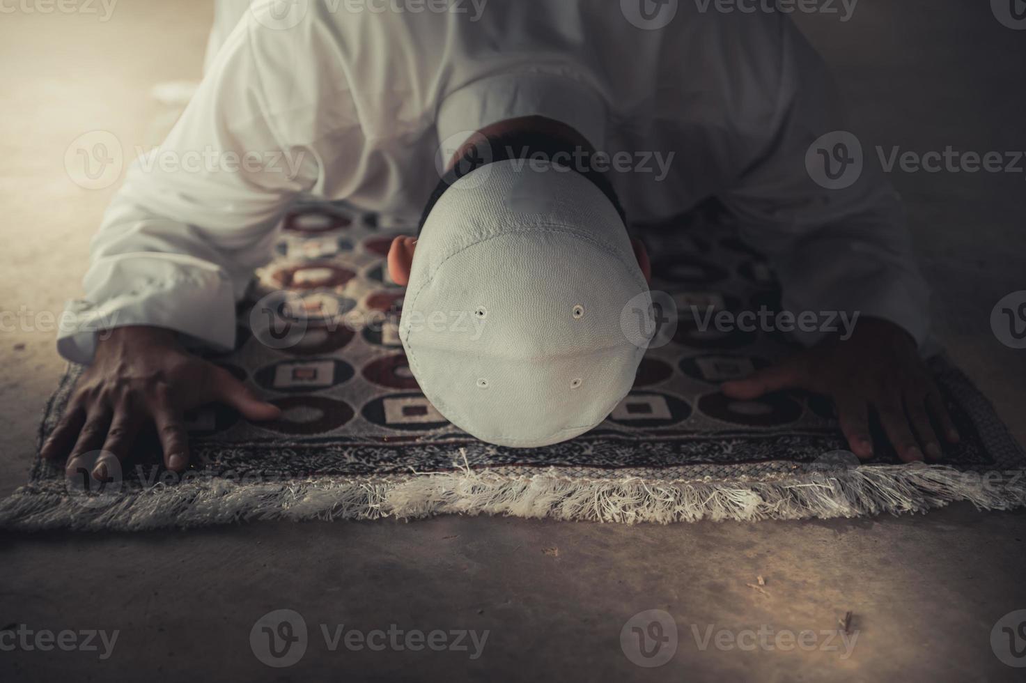 Asian islam man prayer,Young Muslim praying,Ramadan festival concept photo