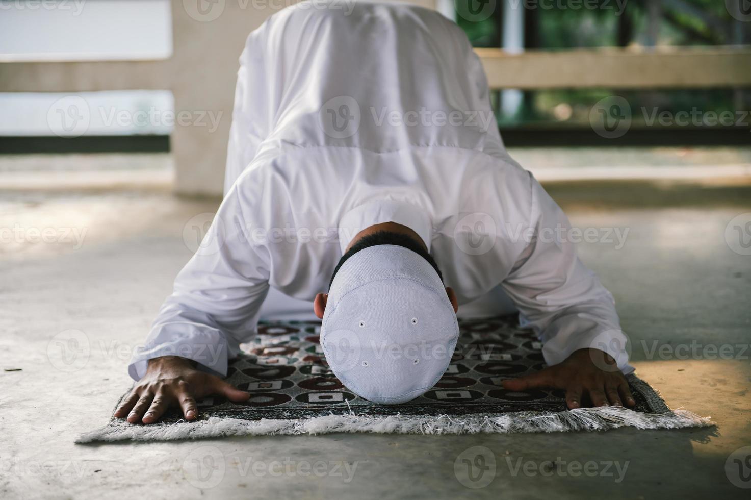 Asian islam man prayer,Young Muslim praying,Ramadan festival concept photo