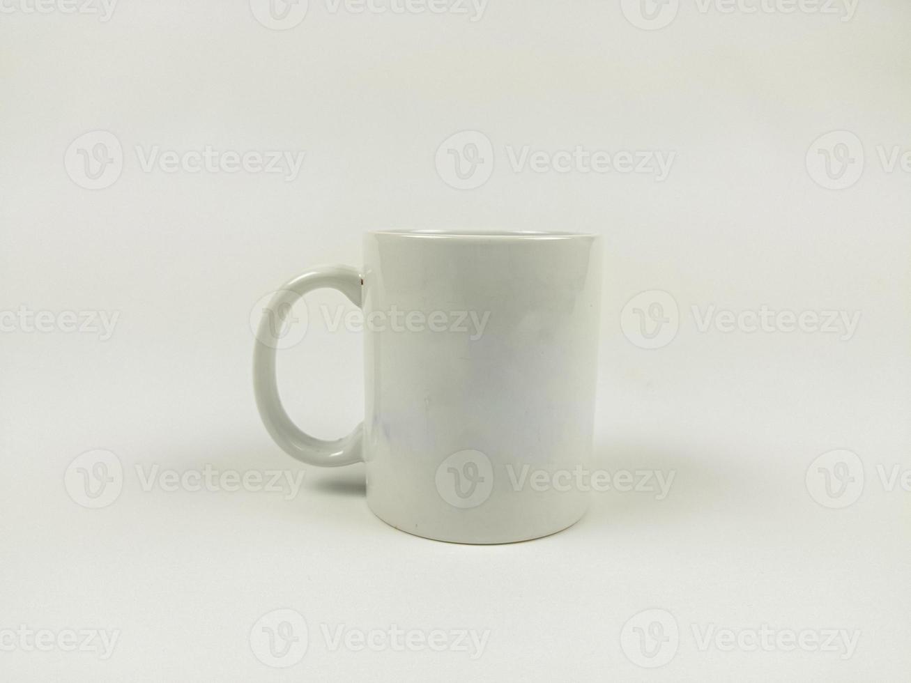 mock up mug. Template of a white mug on the white background photo