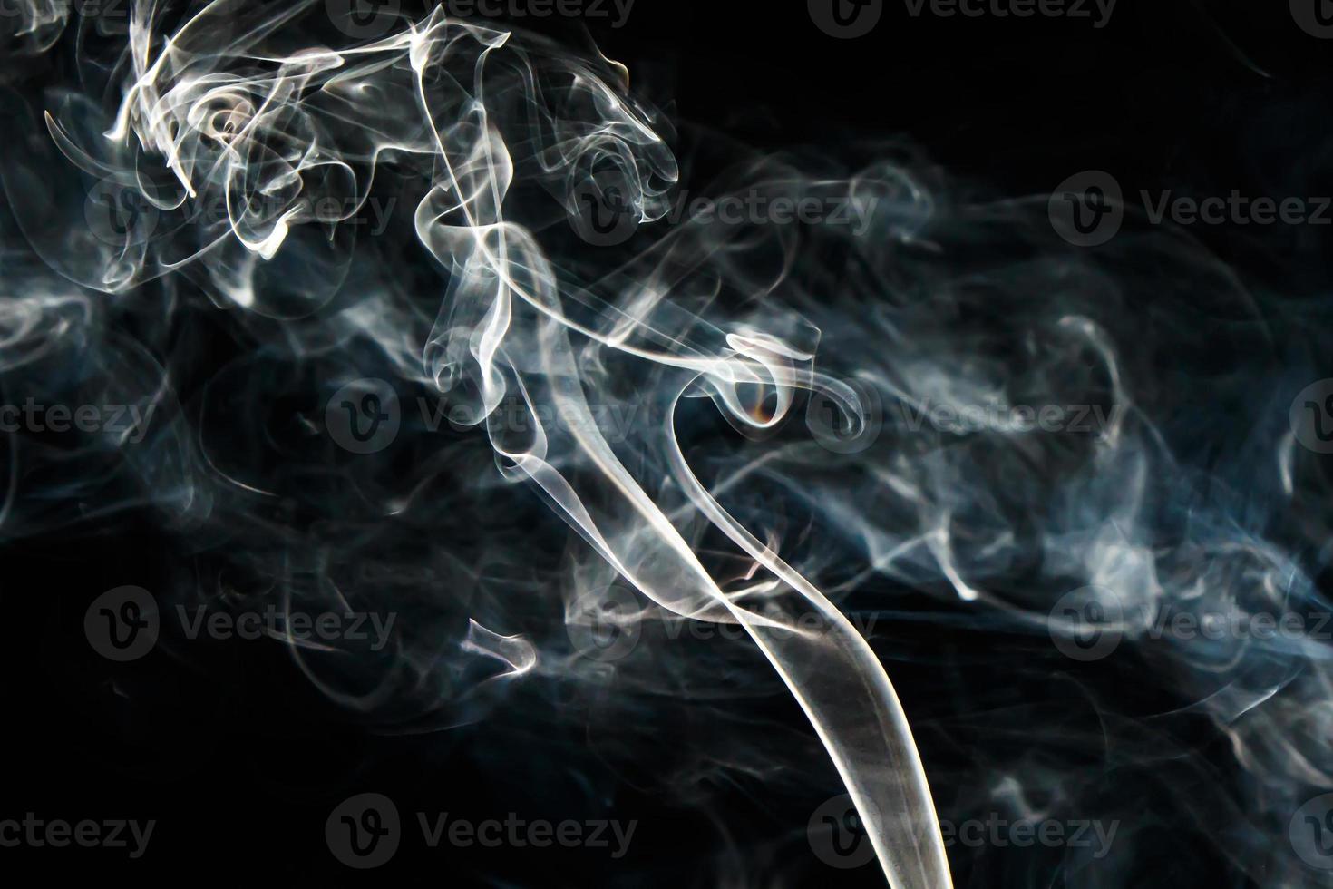 Smoke effect texture. Isolated background. Black and dark backdrop. Smokey fire and mistic effect. photo