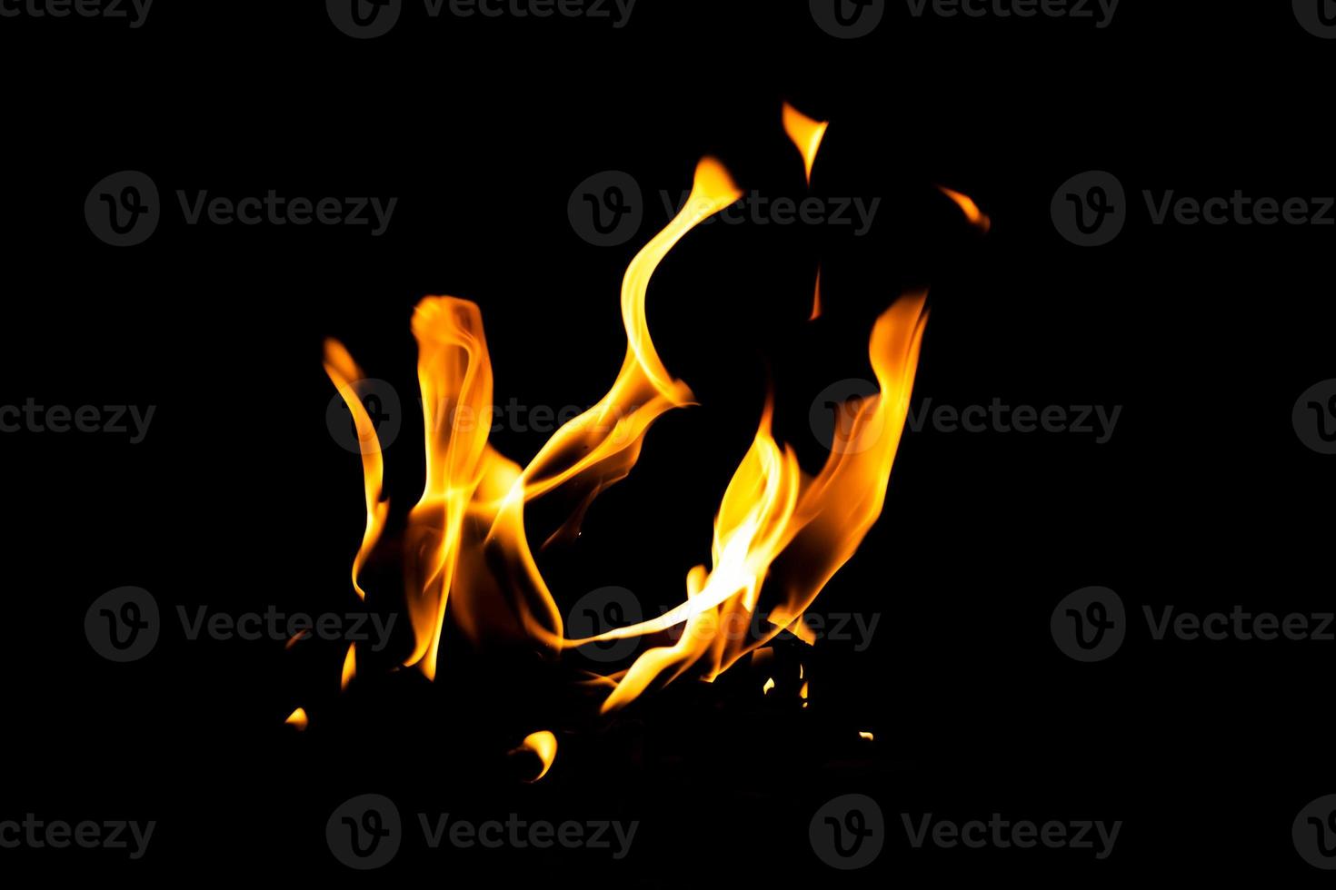 Fire flame texture. Burning material backdrop. Burn effect pattern. Blaze and torch wallpaper. Heat and haze backdrop. photo