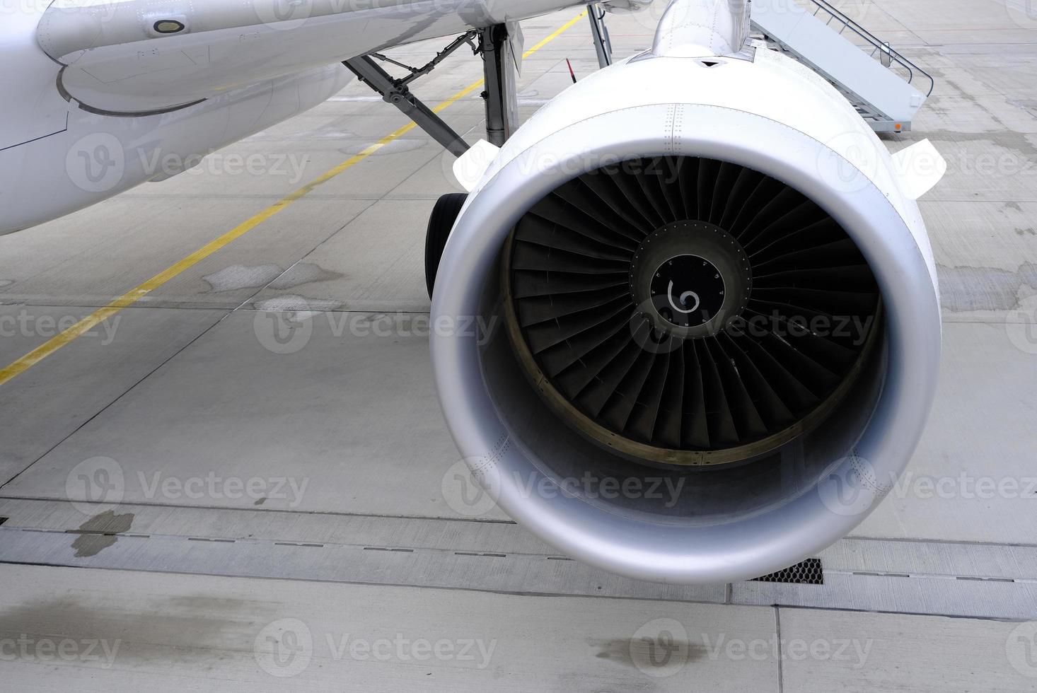 Close up Airplane Turbine at the Airport. photo