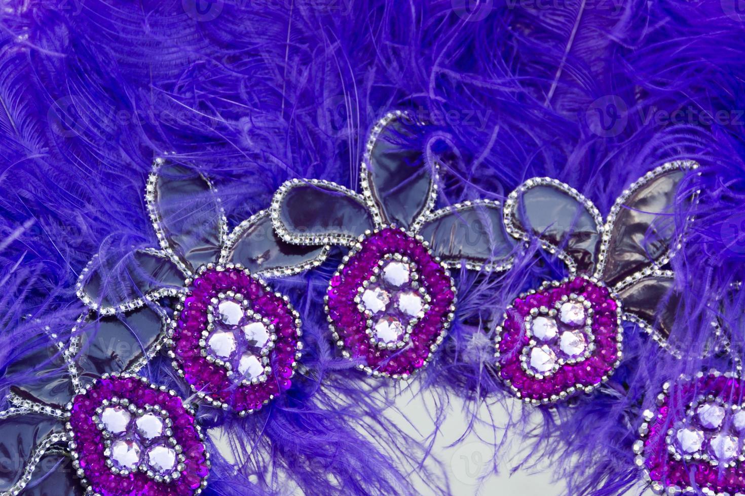 Embroidered helmet with stones and feathers for carnival photo