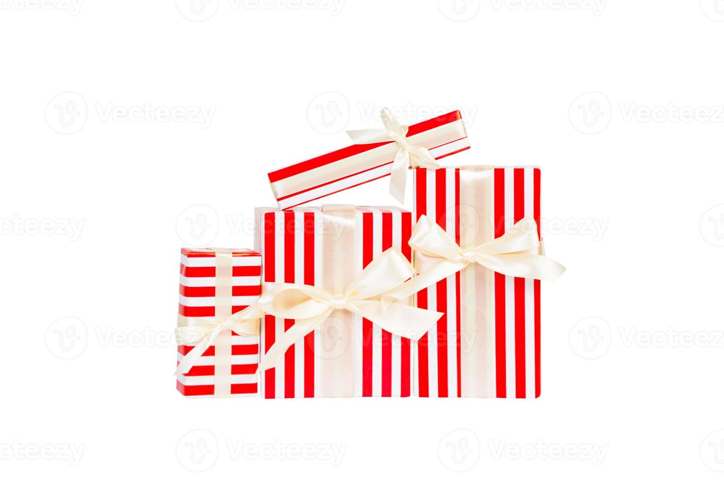 Set of Christmas or other holiday handmade present in red paper with gold ribbon. Isolated on white background, top view. thanksgiving Gift box concept photo