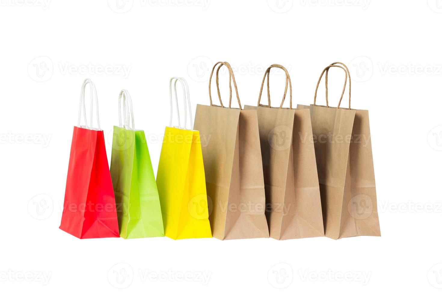 Set of colored and brown paper shopping bags isolated photo