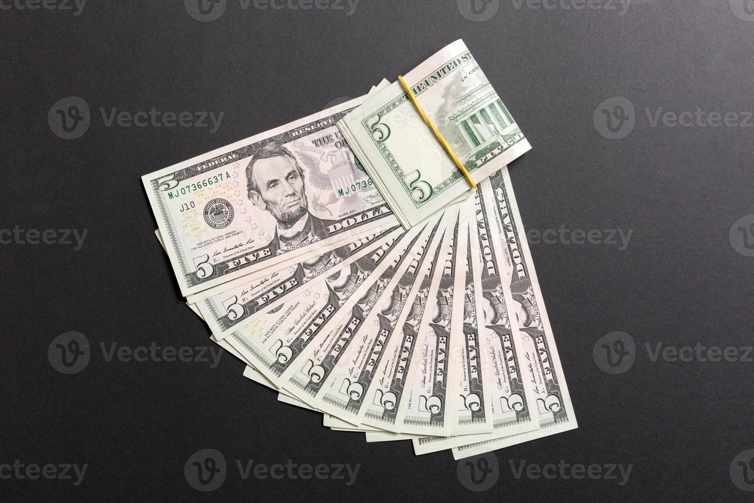 A Hundred dollar fan close up, Top view of business concept on colored background photo