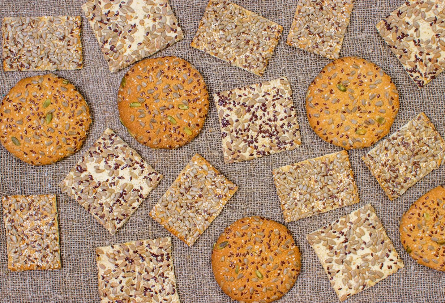 Rows of various shortbread and oat cookies. photo
