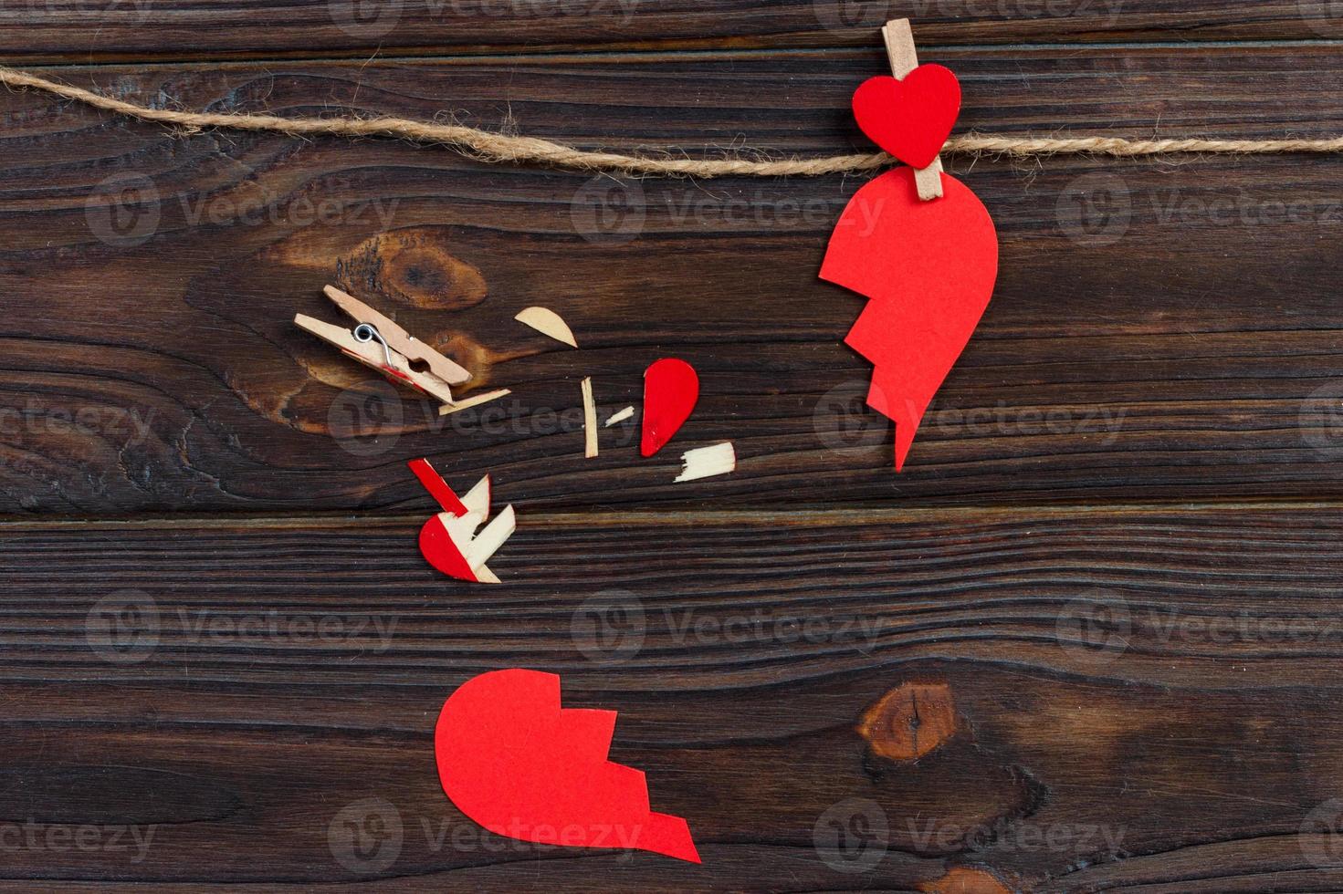 Broken heart breakup collection and divorce icon. Red paper shaped as a torn love , health care problems due to illness. Broken love concept photo