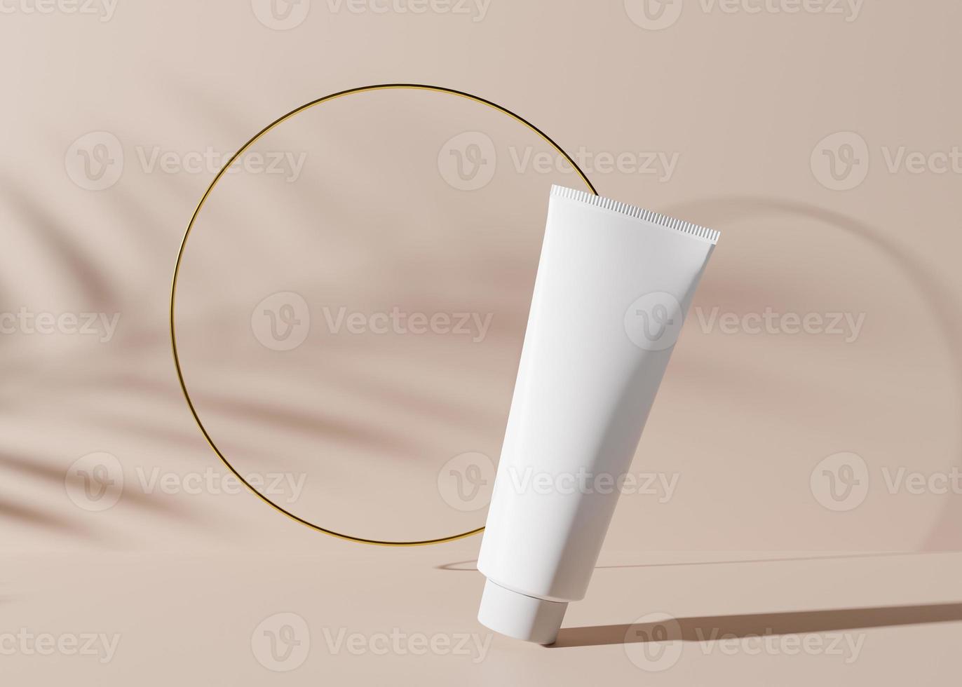 White and blank, unbranded cosmetic cream tube with golden ring and plants shadows. Skin care product presentation on light brown background. Luxury mockup. Tube with copy space. 3D rendering. photo