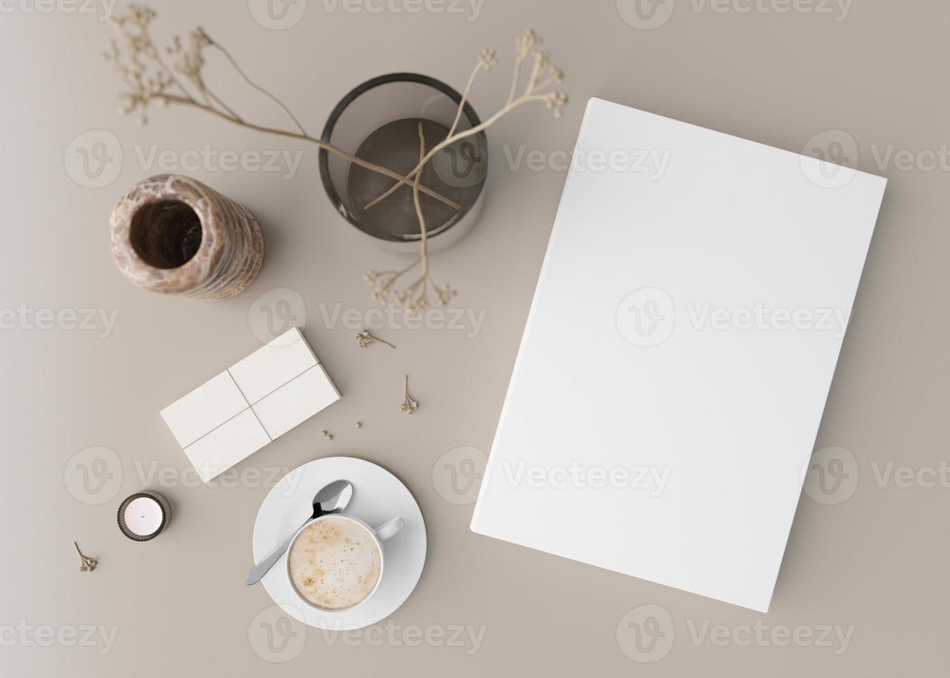 White book cover mock up with coffee cup, vase and other home accessories on beige table. Blank template for your design. Top view, close-up. Book, catalogue or magazine cover presentation. 3D render. photo