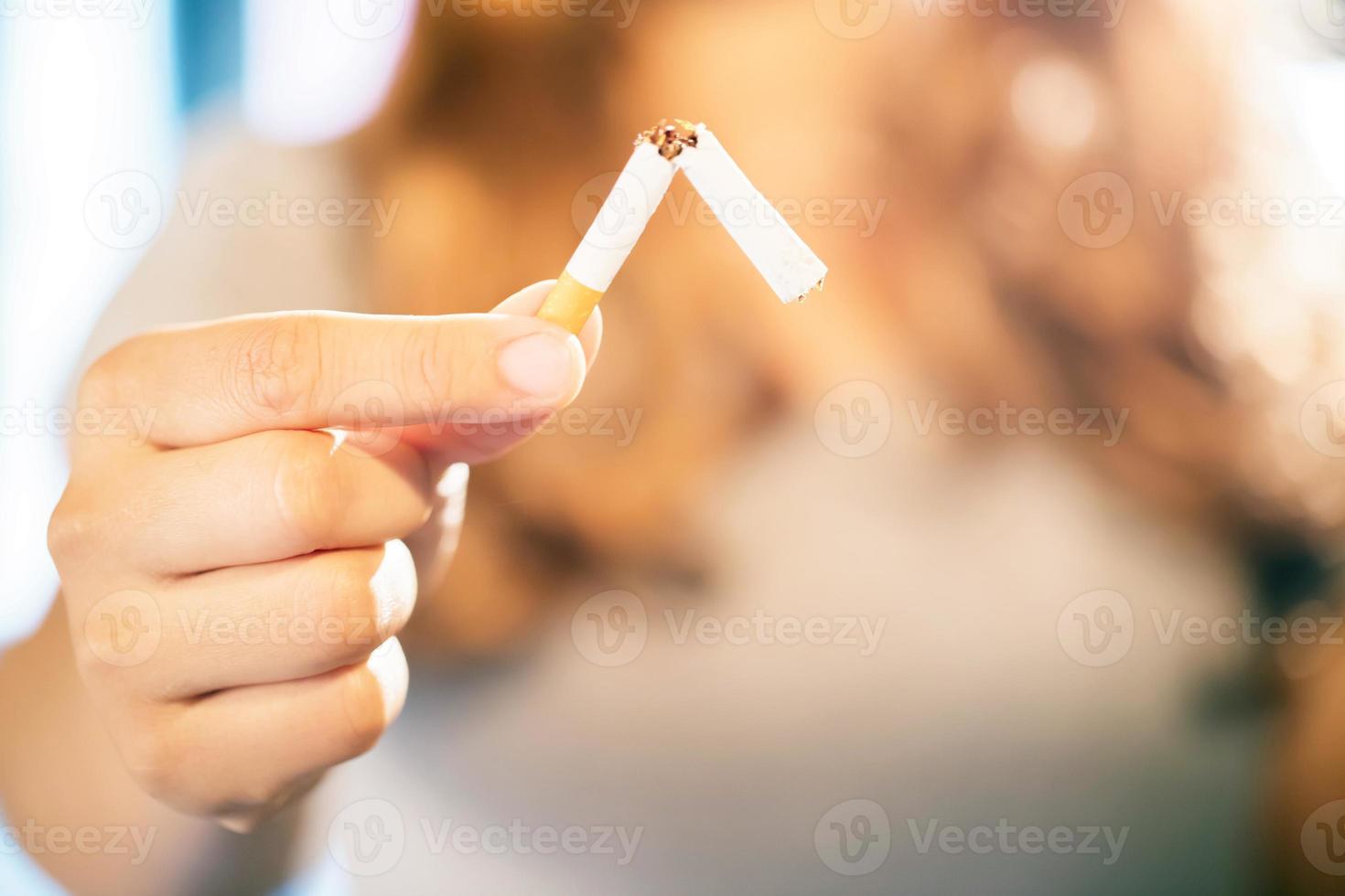 Focus hand, Women quit smoking For good health of oneself photo