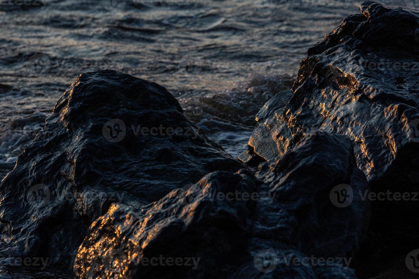 Stones on The Coast of The Baltic Sea at Sunset photo