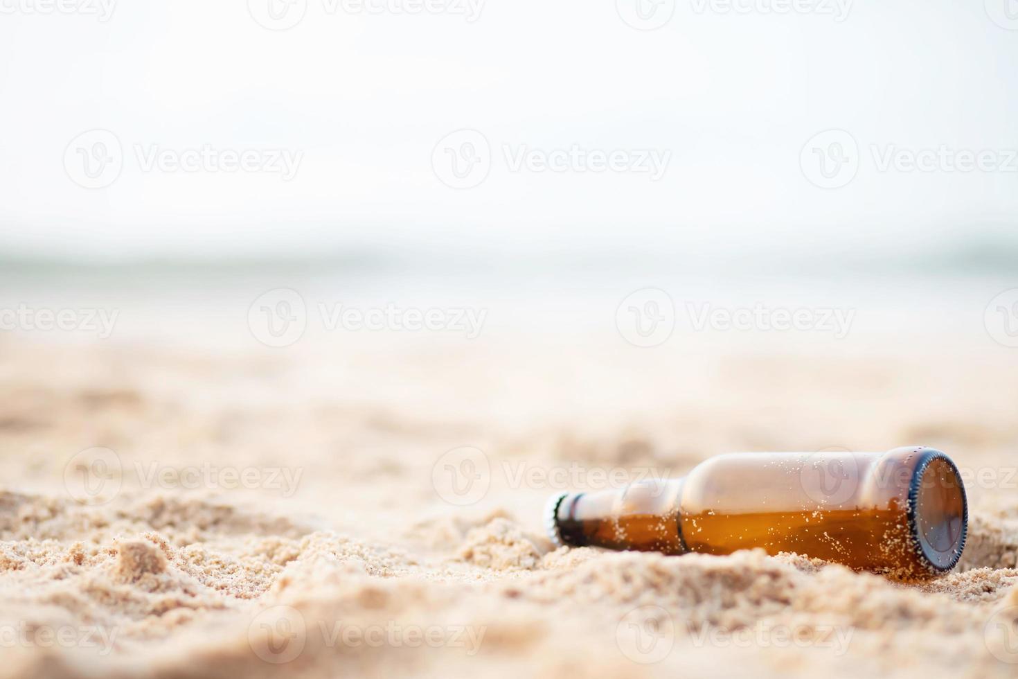 garbage bottles on the beach photo