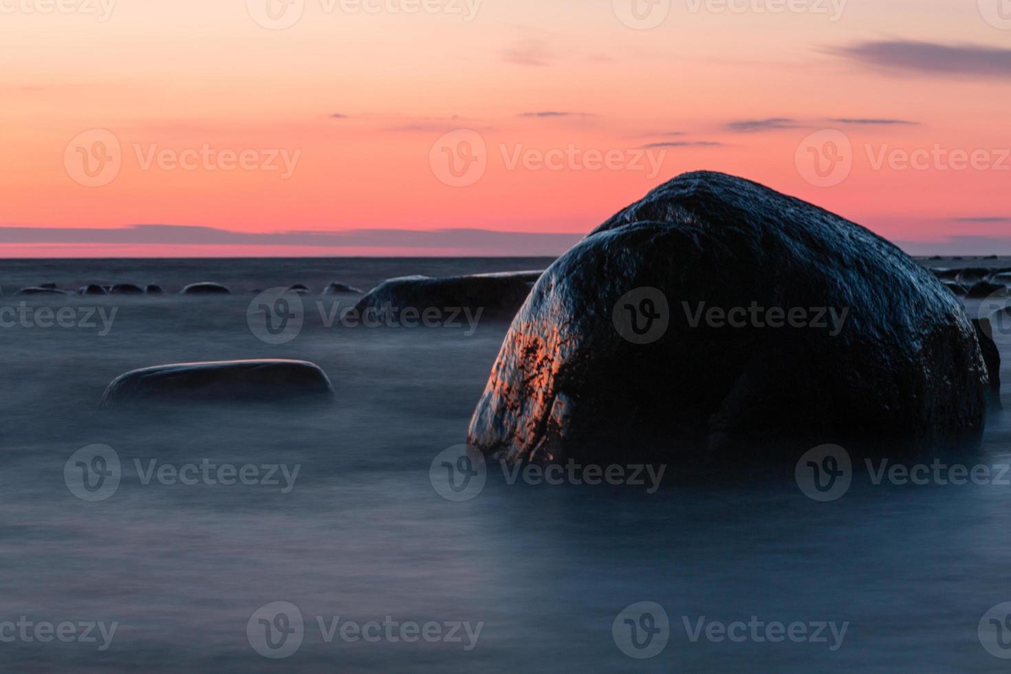 Stones on The Coast of The Baltic Sea at Sunset photo