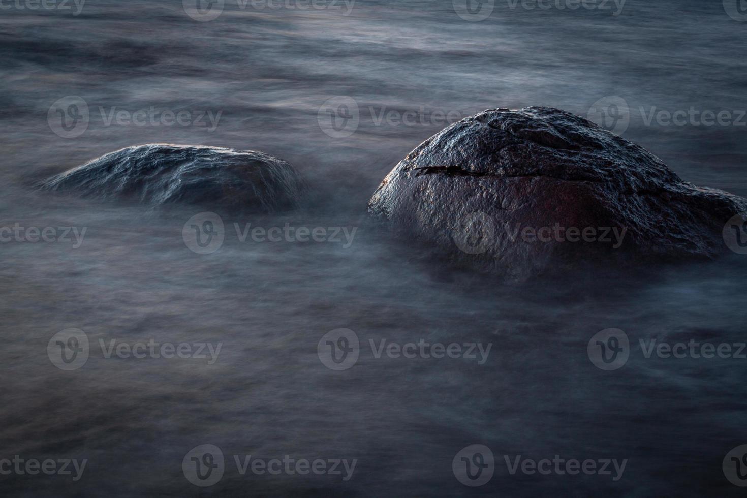 Stones on The Coast of The Baltic Sea at Sunset photo