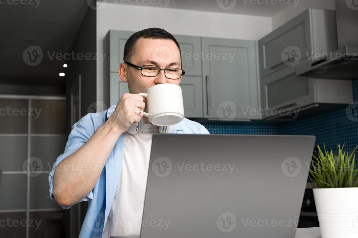 Work from home banner with asian male drinking coffee. Online business or education.Programming courses photo