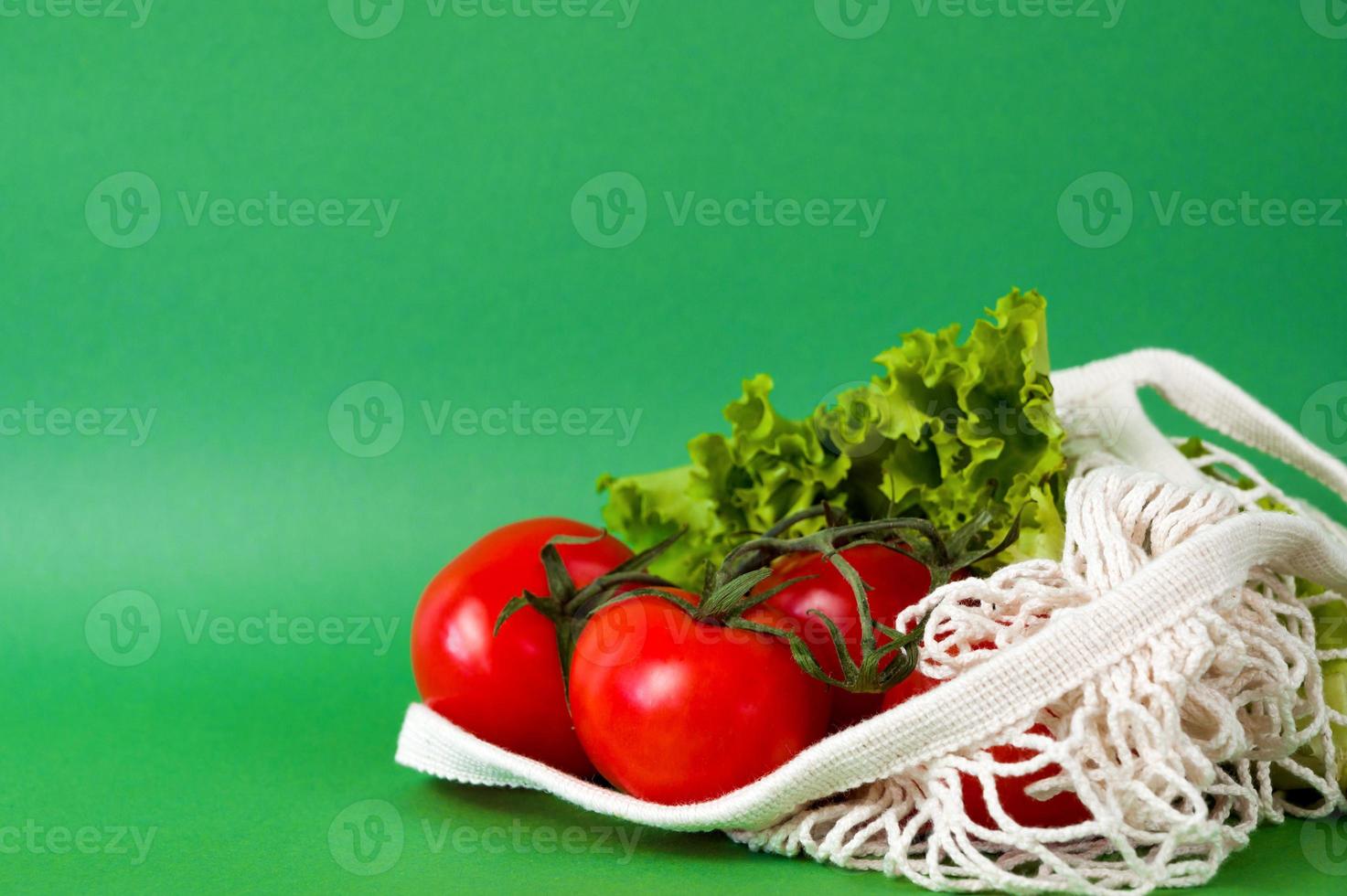 Fresh vegetables in string bag. Sustainable shopping concept. Eco-friendly photo