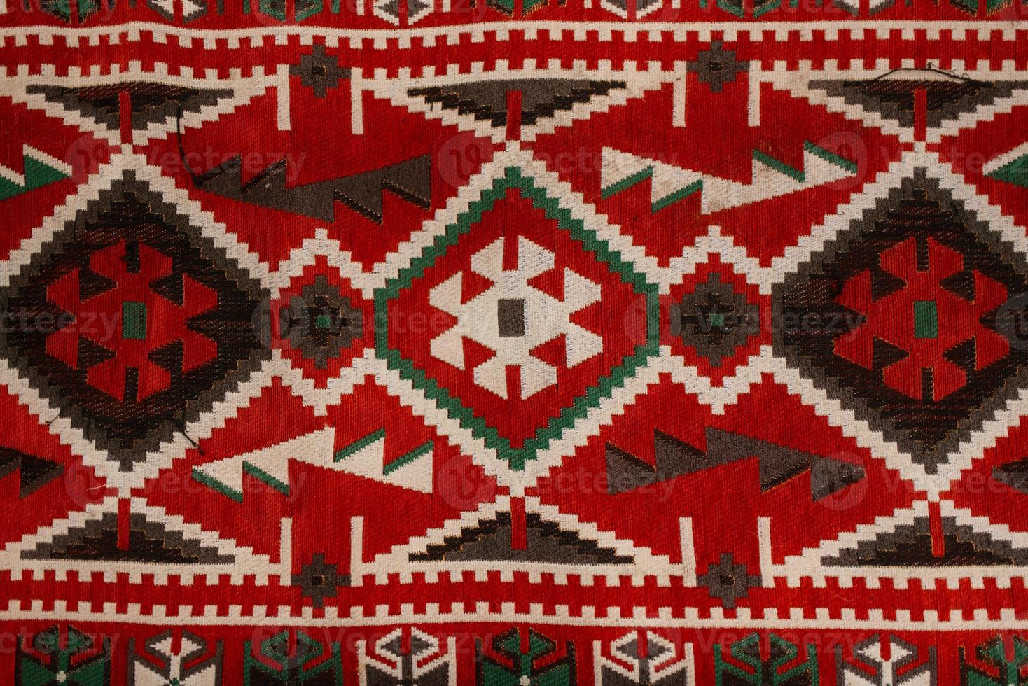 carpet with a red pattern photo