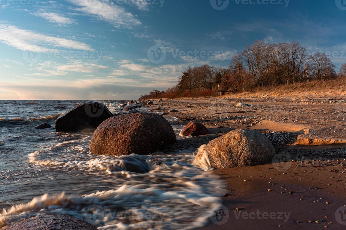 Stones on The Coast of The Baltic Sea at Sunset photo