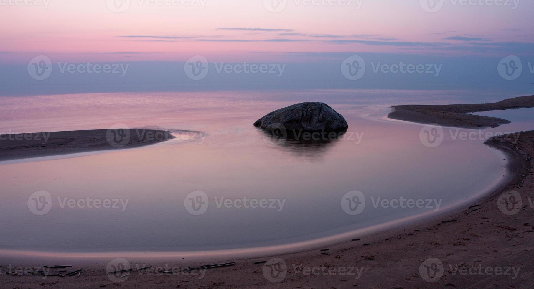 Stones on The Coast of The Baltic Sea at Sunset photo