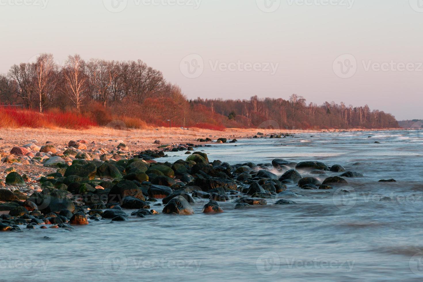 Stones on The Coast of The Baltic Sea at Sunset photo