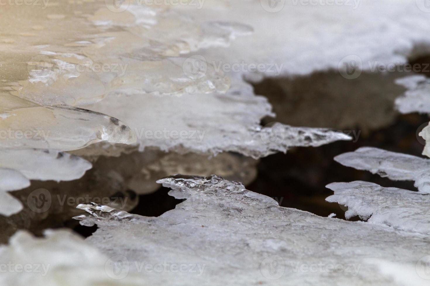 Baltic Sea Coast With Pebbles And Ice at Sunset photo