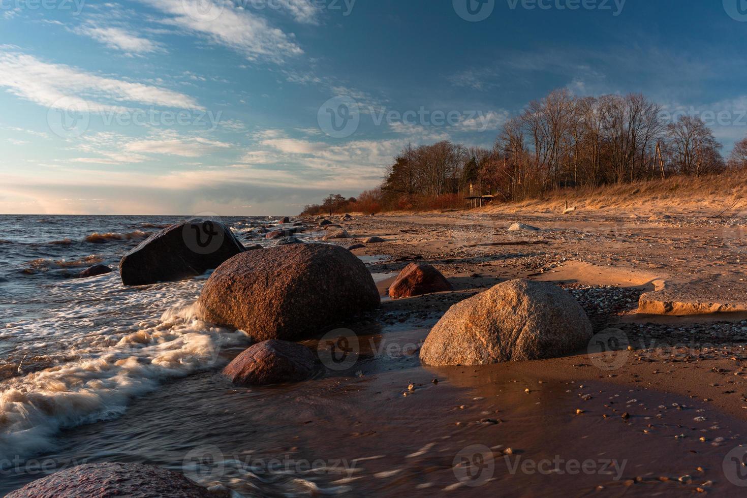 Stones on The Coast of The Baltic Sea at Sunset photo