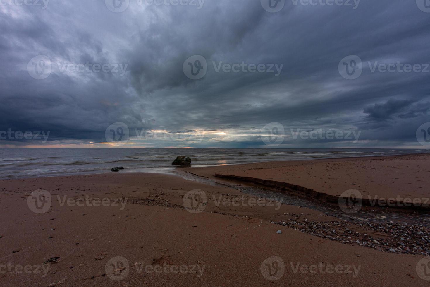 Stones on The Coast of The Baltic Sea at Sunset photo