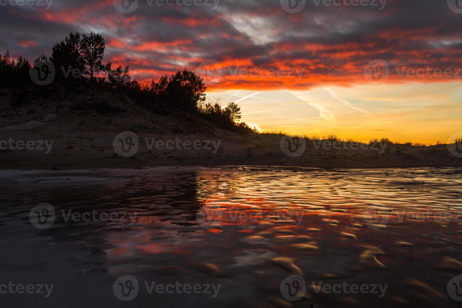 Baltic Sea Coast in Winter With Ice at Sunset photo