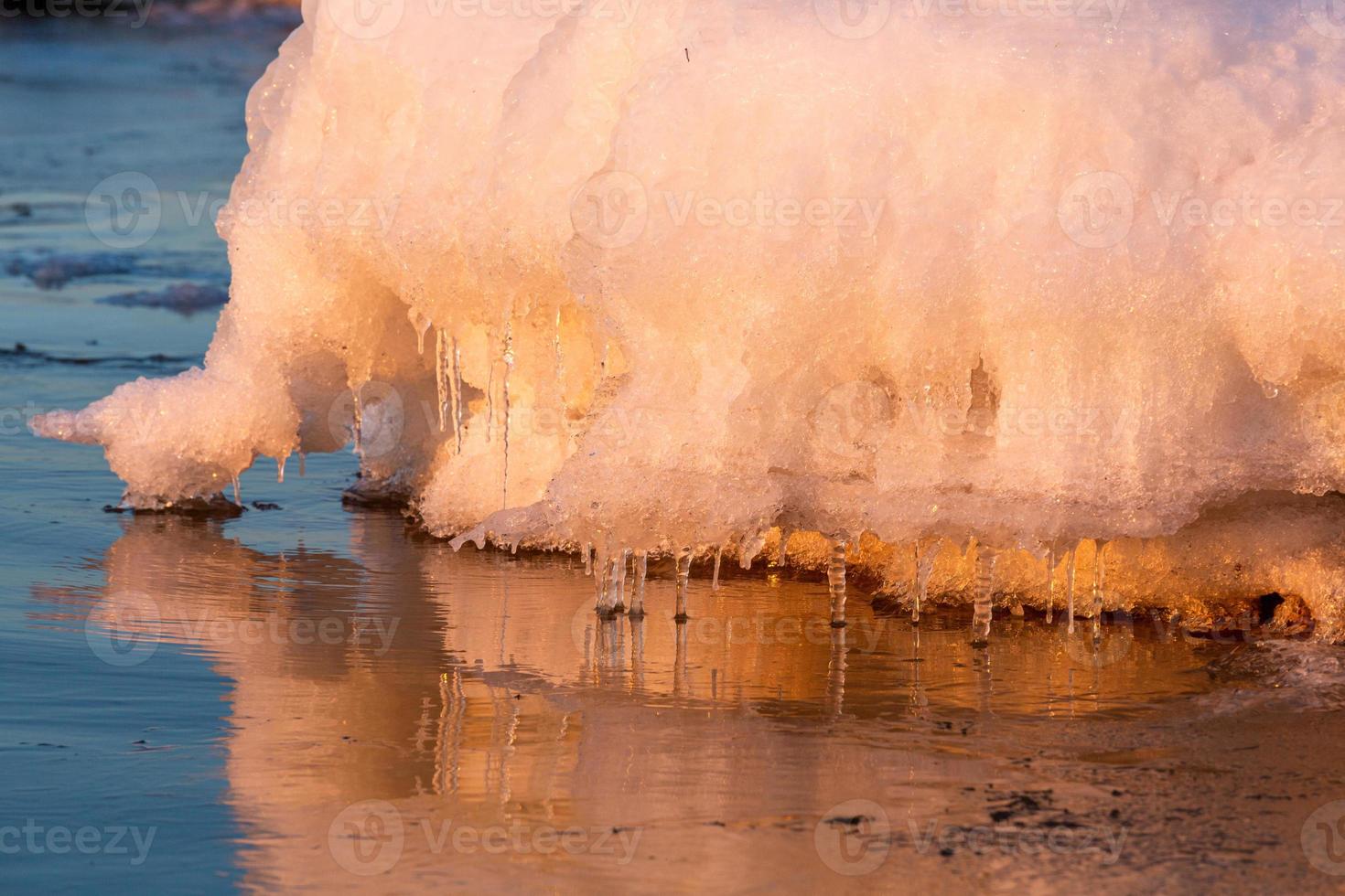 Baltic Sea Coast in Winter With Ice at Sunset photo