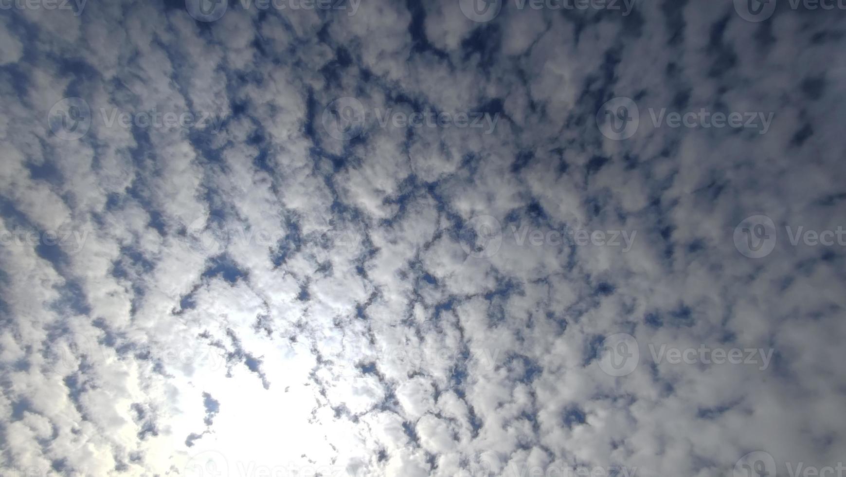 Cloud sky with the sun from behind photo