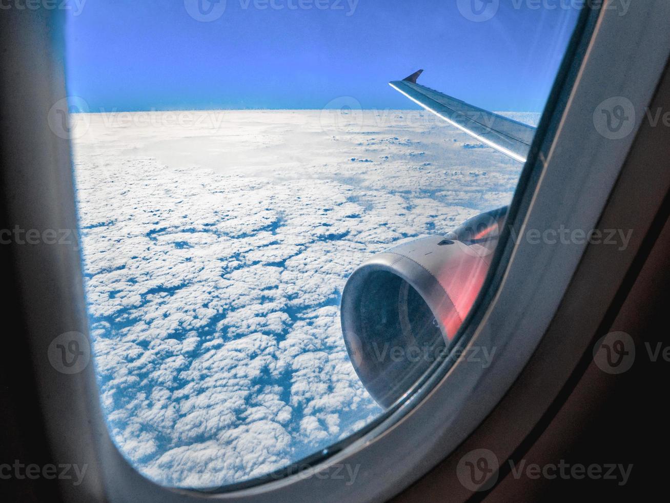 View of the clouds from an aircraft window photo