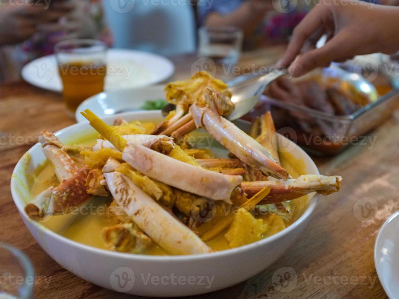 Crab in turmeric sauce photo