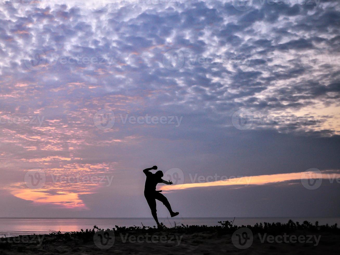 Morning jogger by the beach photo