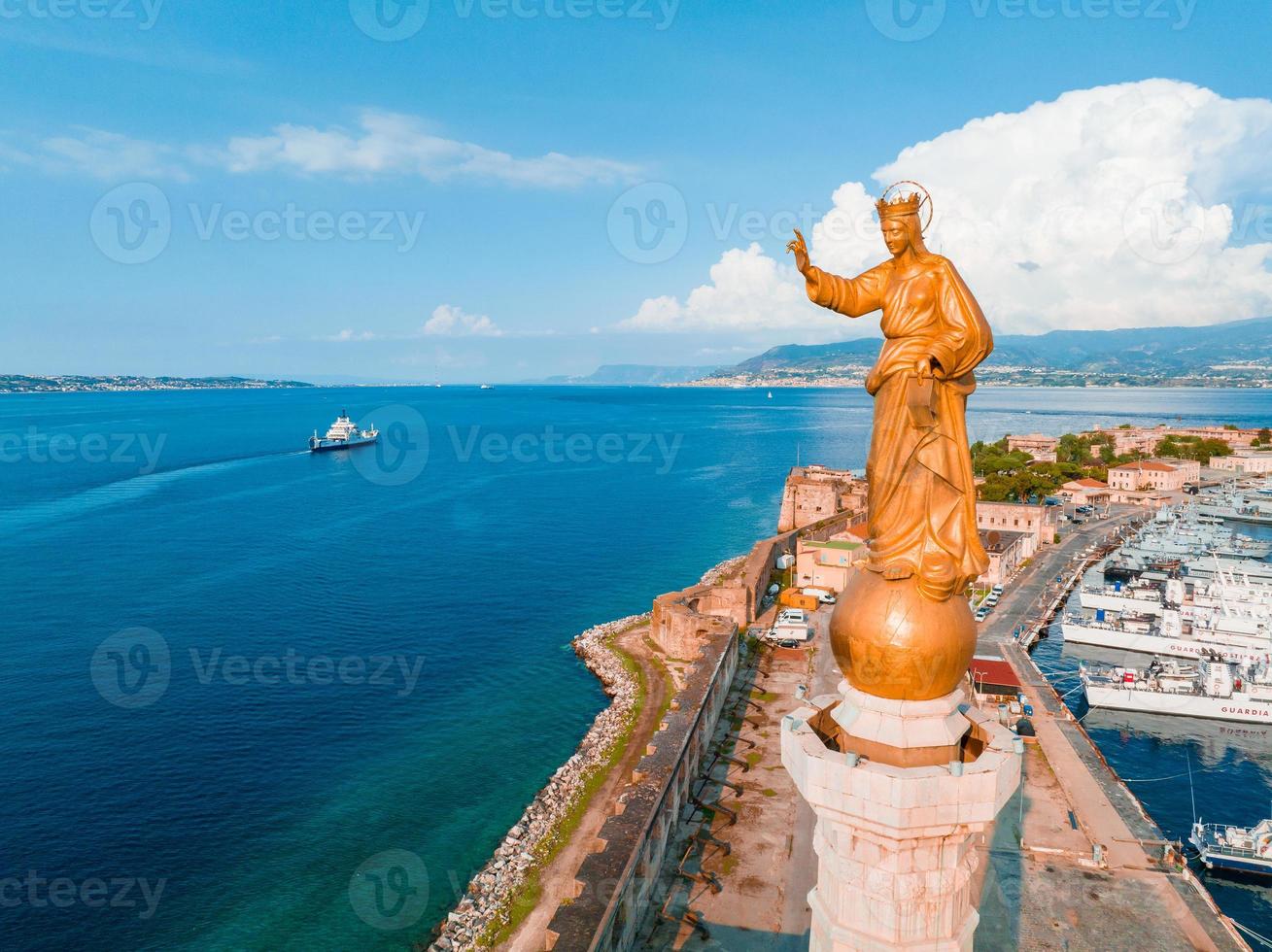 View of the Messina's port with the gold Madonna della Lettera statue photo