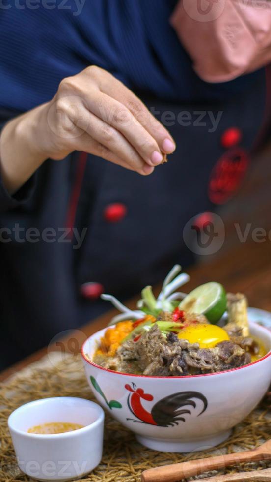 a typical sulawesi food called pallu basa photo
