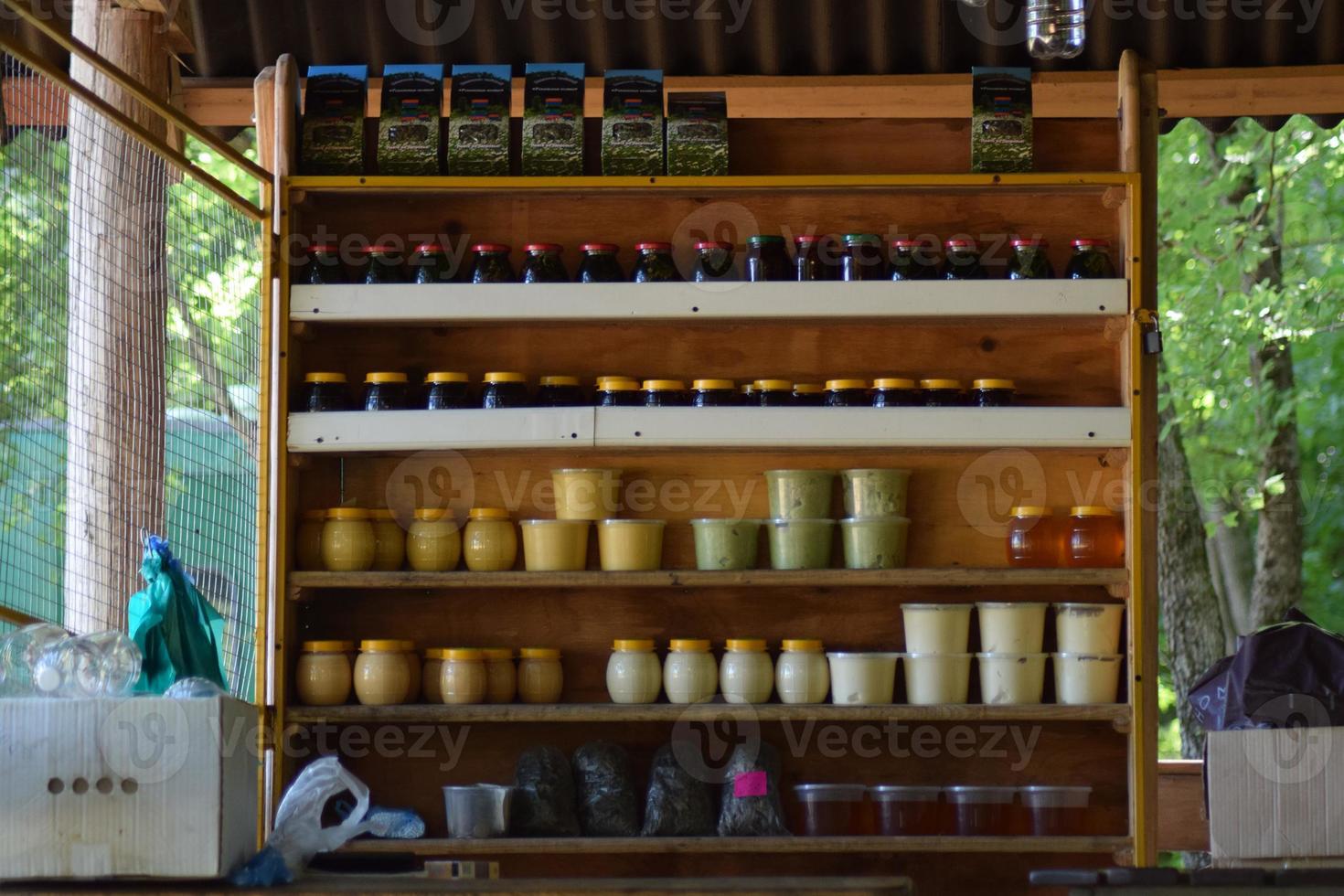 Jars of honey on the counter photo