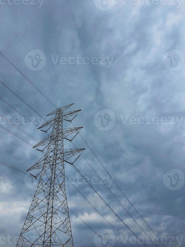 This is a photo of an extra high voltage overhead line tower soaring high into the sky.