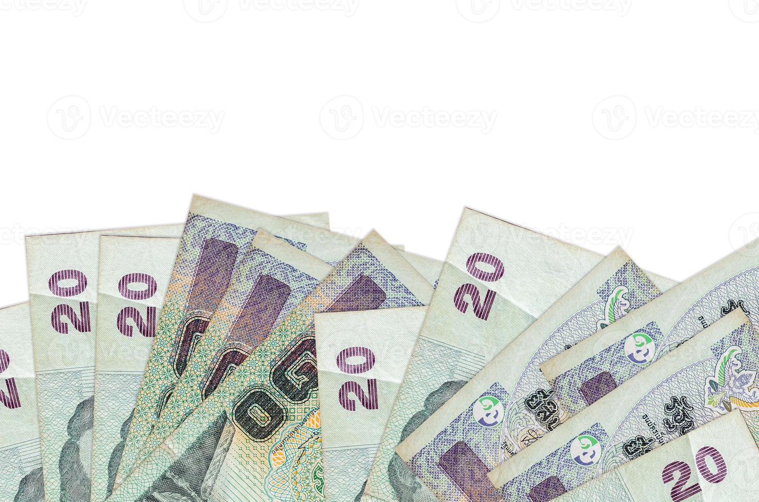 20 Thai Baht bills lies on bottom side of screen isolated on white background with copy space. Background banner template photo