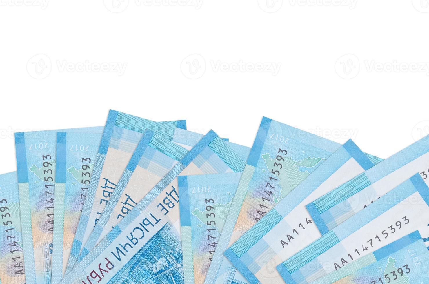 2000 russian rubles bills lies on bottom side of screen isolated on white background with copy space. Background banner template photo